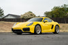 PORSCHE 981 ケイマン GTS に APEX ML-10RT 18x9J ET46 / 18x10J ET36 マシンドリップ モータースポーツゴールドを装着